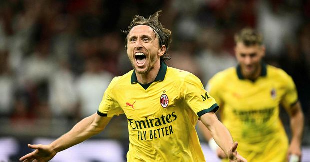 Luka Modric að fasgna sigurmarkinu.