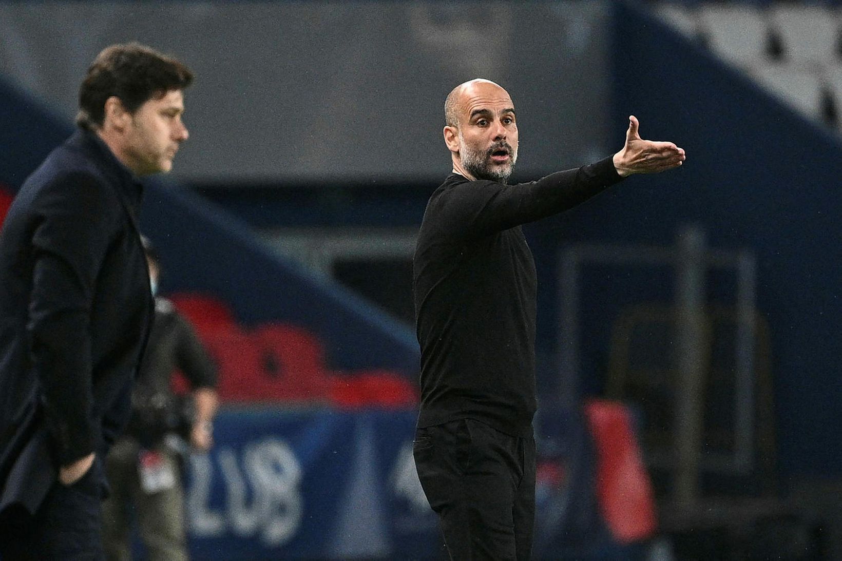 Pep Guardiola og Mauricio Pochettino á hliðarlínunni í kvöld.