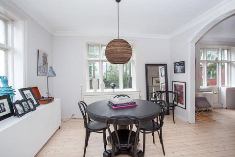 The dining room has original features and wooden floors.