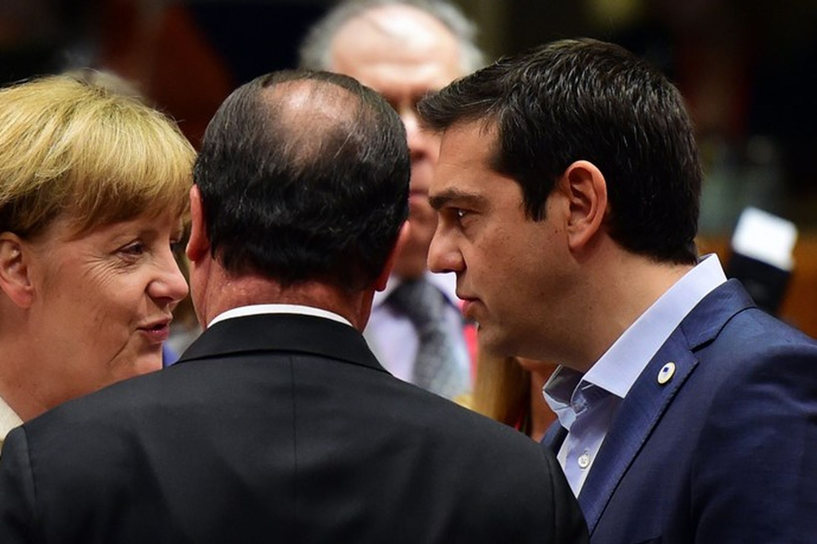 Angela Merkel, Francois Hollande og Alexis Tsipras ræða málin en …