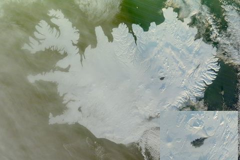 The black lava field is clearly visible on the snowy landscape. The right hand corner shows an enlarged image of the lavafield.