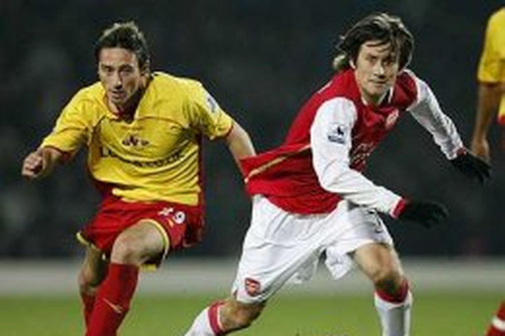 Tommy Smith, til vinstri, í leik með Watford gegn Arsenal.