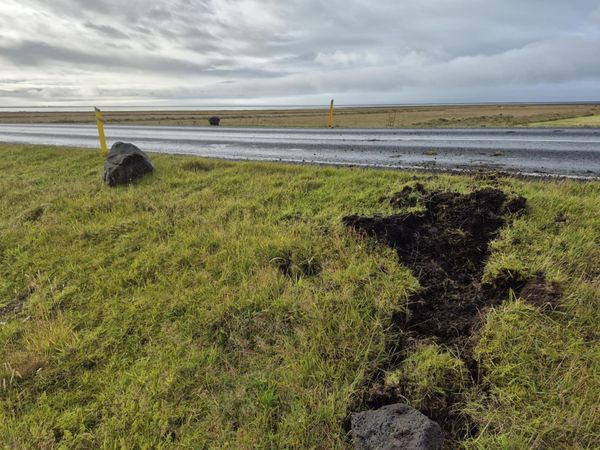 Boulders landed on the road and also crossed over it.