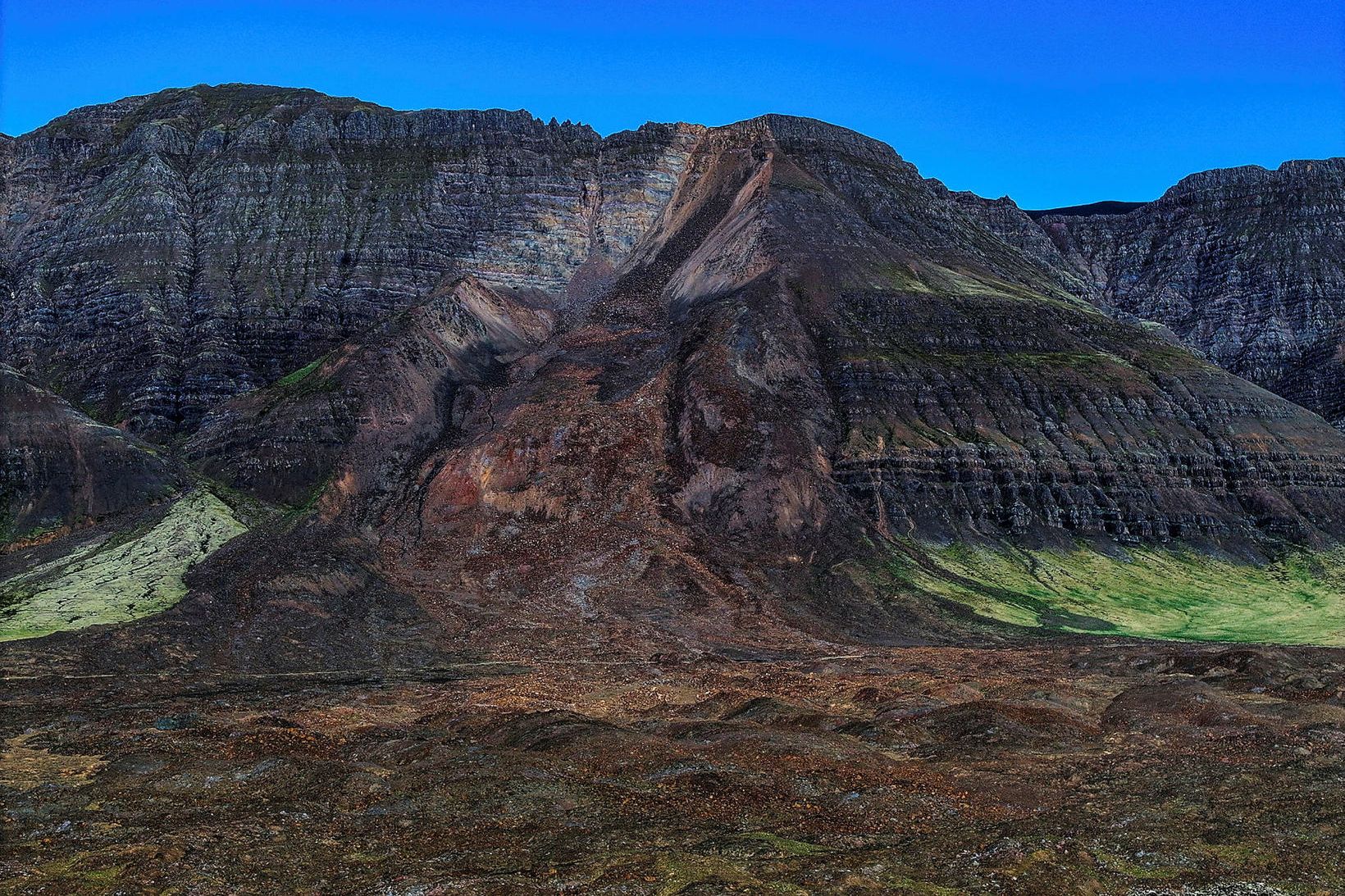 Mikil skriða féll úr Fagraskógarfjalli í byrjun júlí árið 2018. …