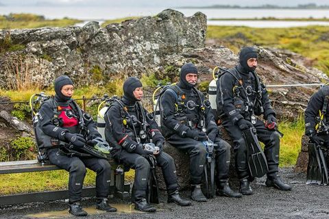 Tourists waiting to dive at Silfra.