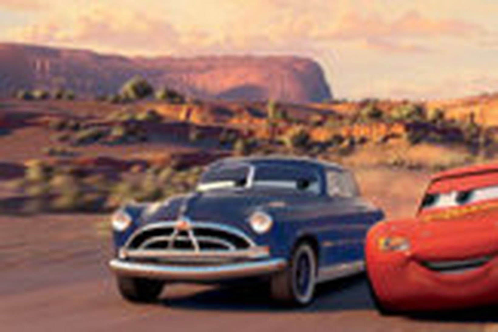 Bílarnir Doc Hudson, leikinn af Paul Newman, og Lightning McQueen, …