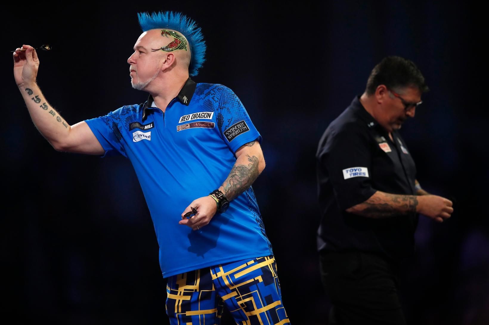 Peter Wright sló Gary Anderson úr leik í gær.