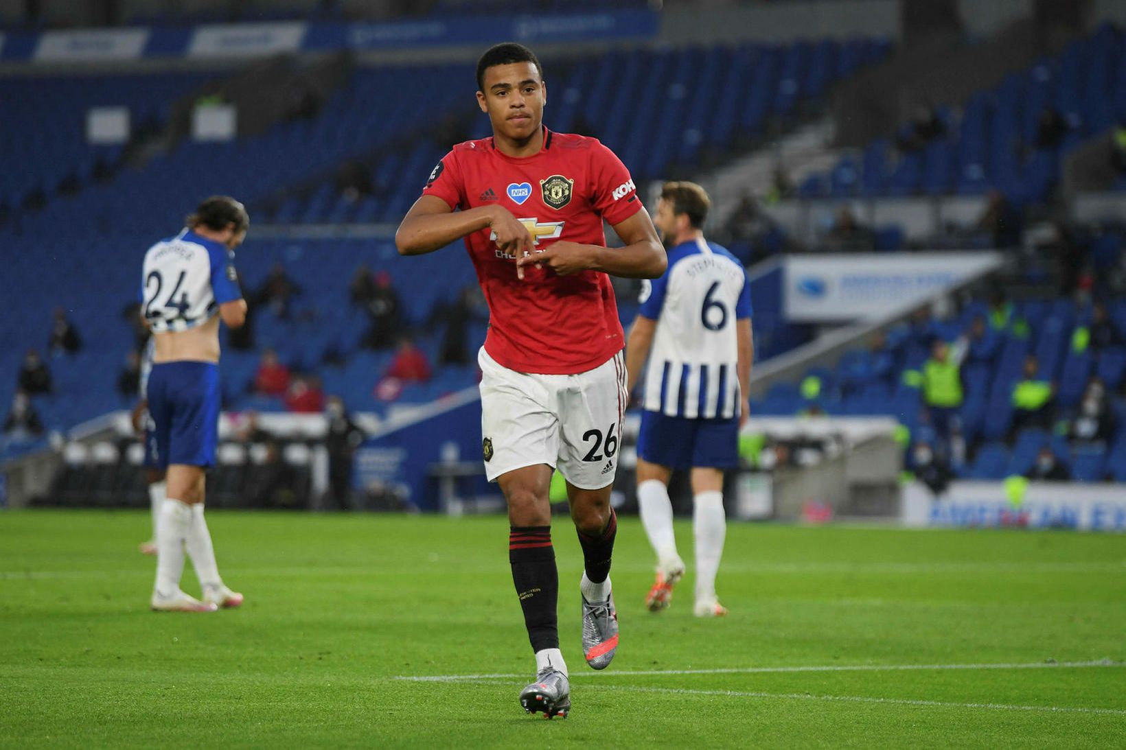 Mason Greenwood fagnar fyrsta marki leiksins.