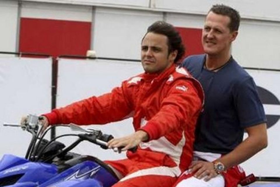 Massa ók Schumacher heiðurshring á fjórhjóli fyrir keppni í Florianopolis.