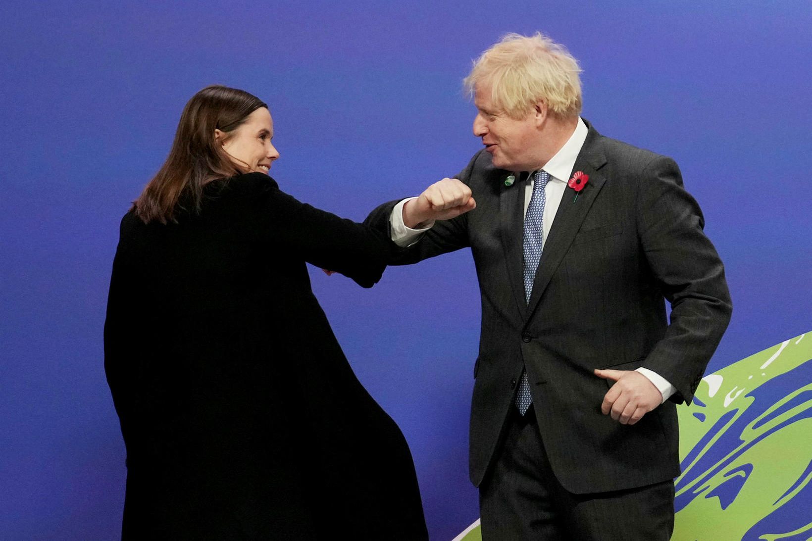 Katrín Jakobsdóttir forsætisráðherra heilsar Boris Johnson forsætisráðherra Bretlands á ráðstefnunni …