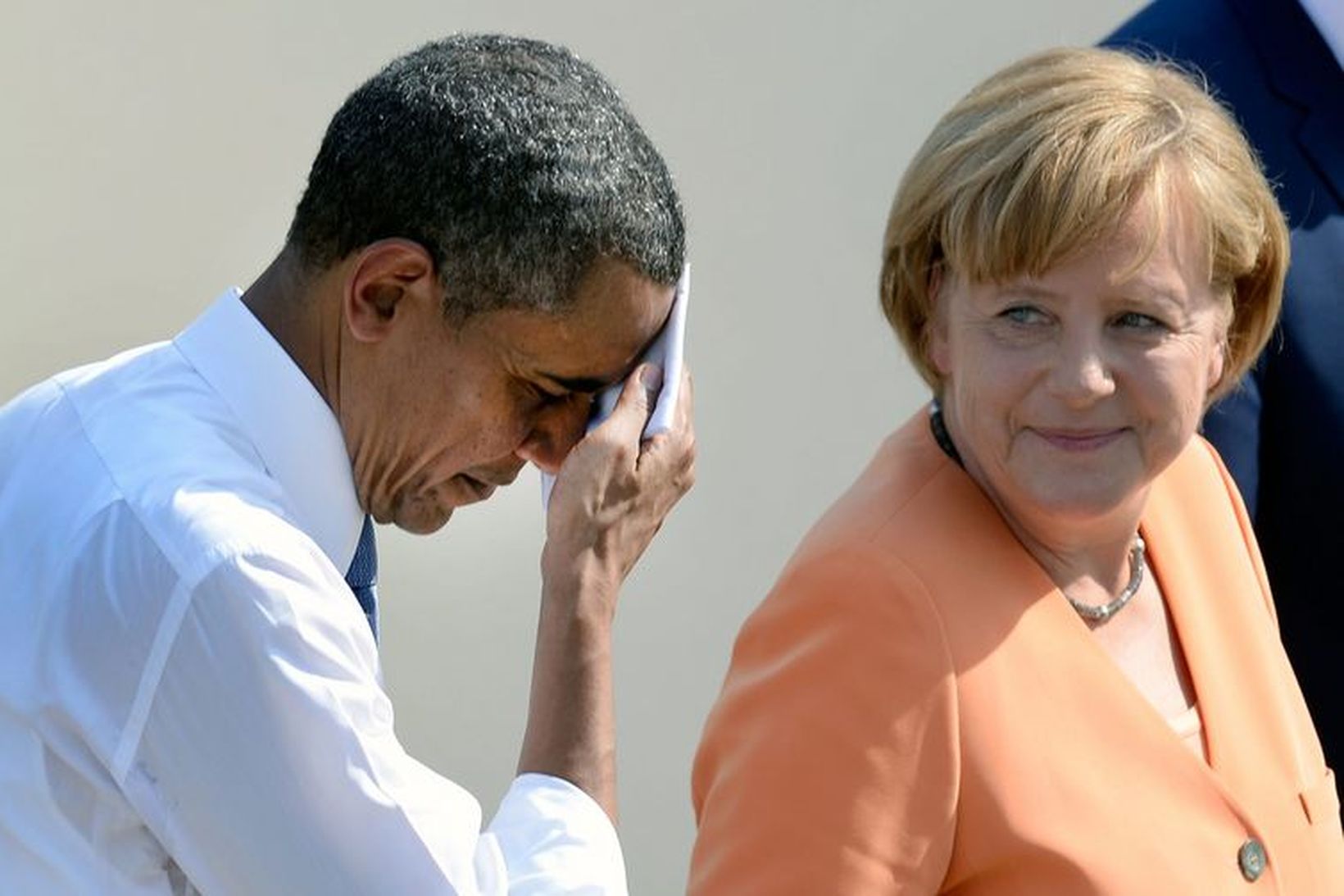 Barack Obama og Angela Merkel á meðan allt lék í …