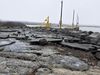 Rocks from the harbor yard were thrown onto the pier and the asphalt has been badly damaged.