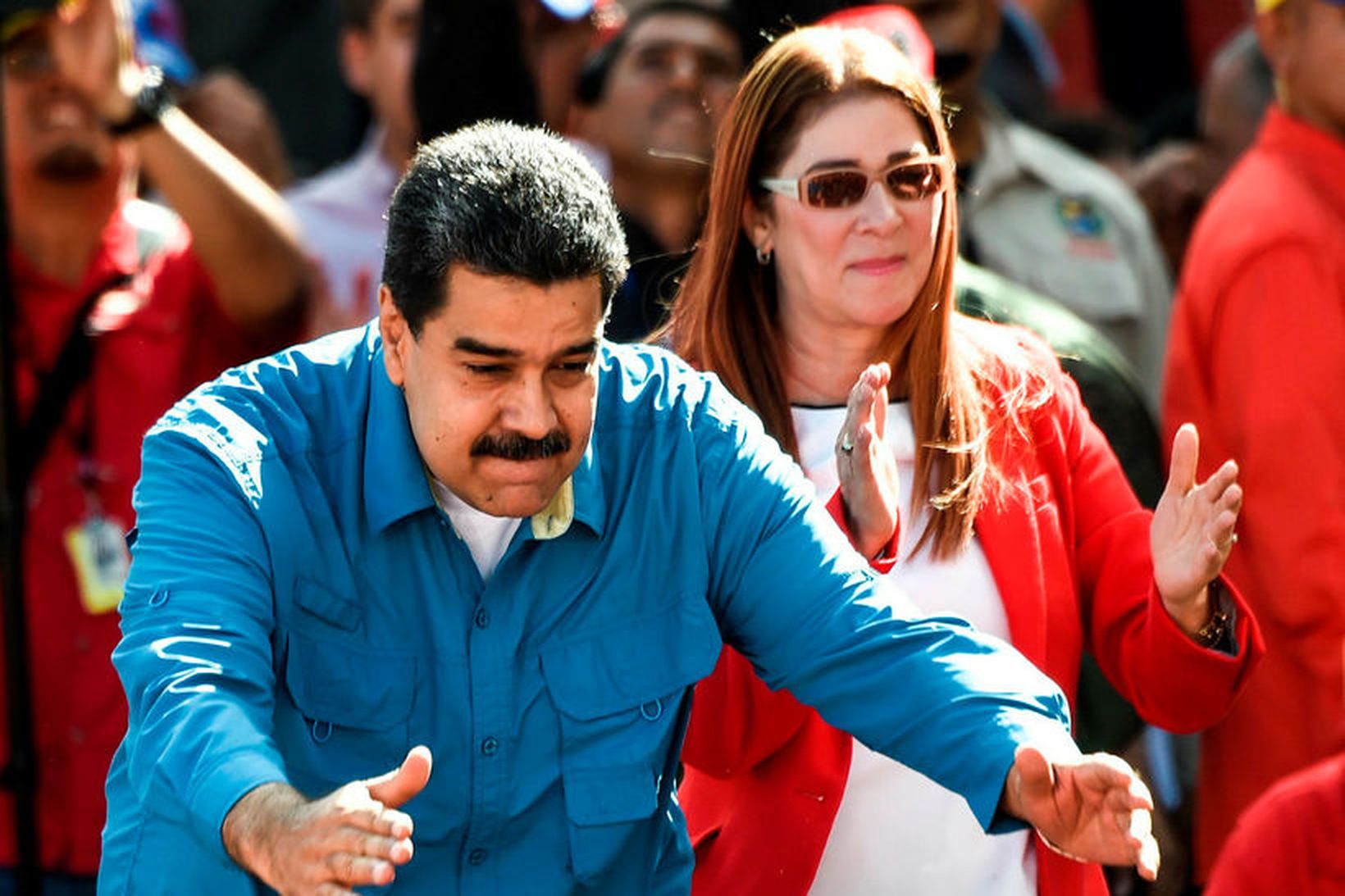 Nicolas Maduro, forseti Venesúela, og kona hans Cilia Flores taka …