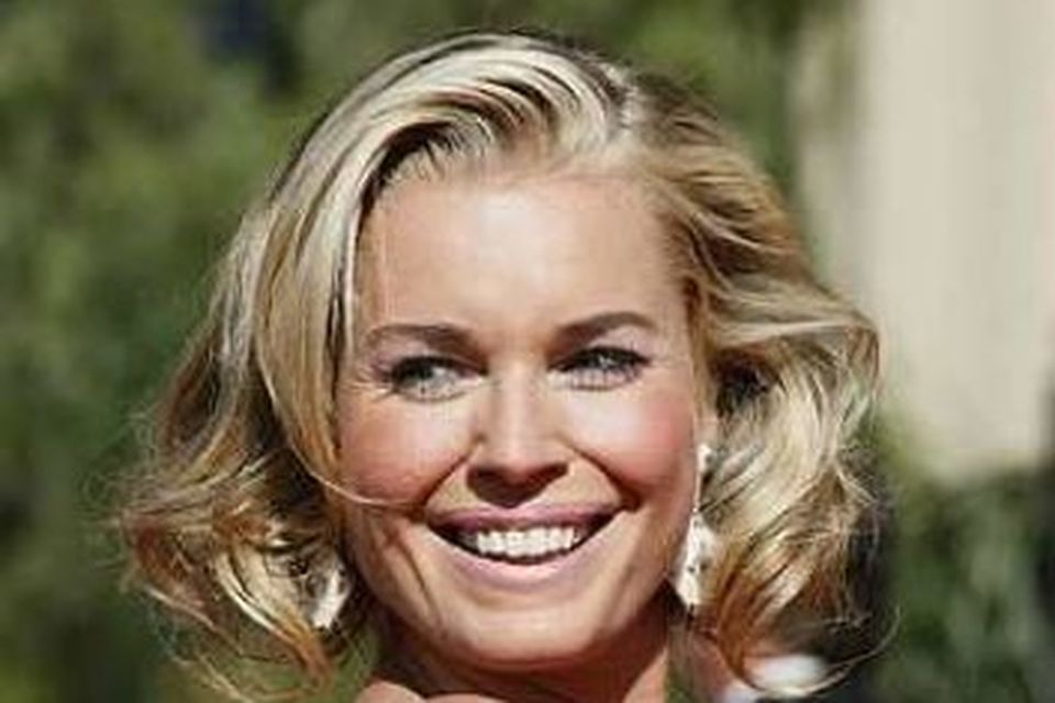 Rebecca Romijn.