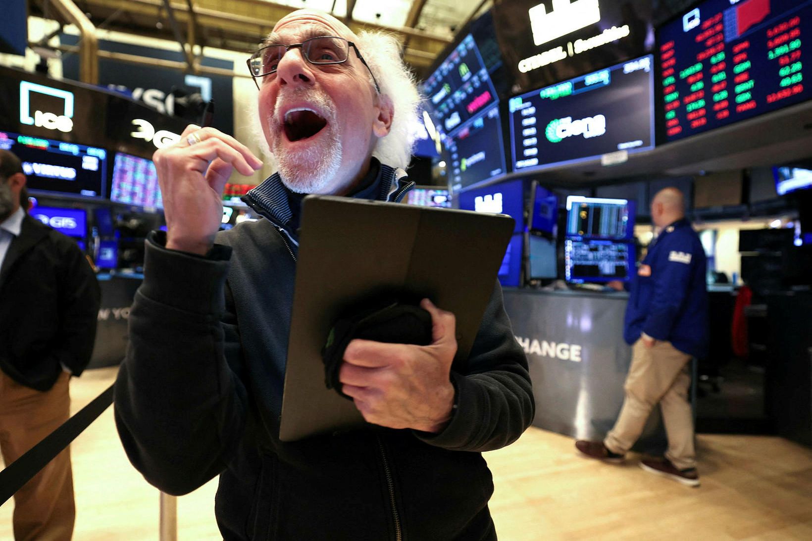Menn voru hæstánægðir á Wall Street.