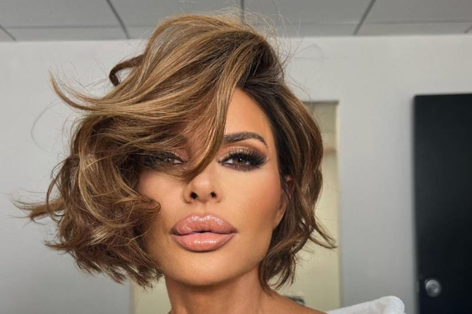 Lisa Rinna er ófeimin við að fækka fötum fyrir framan …