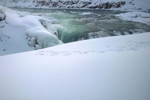 Incredibly, the footprints go to the very edge of a precarious ledge of ice. The massive, powerful waterfall lies just below and should have deterred anyone from venturing so close.