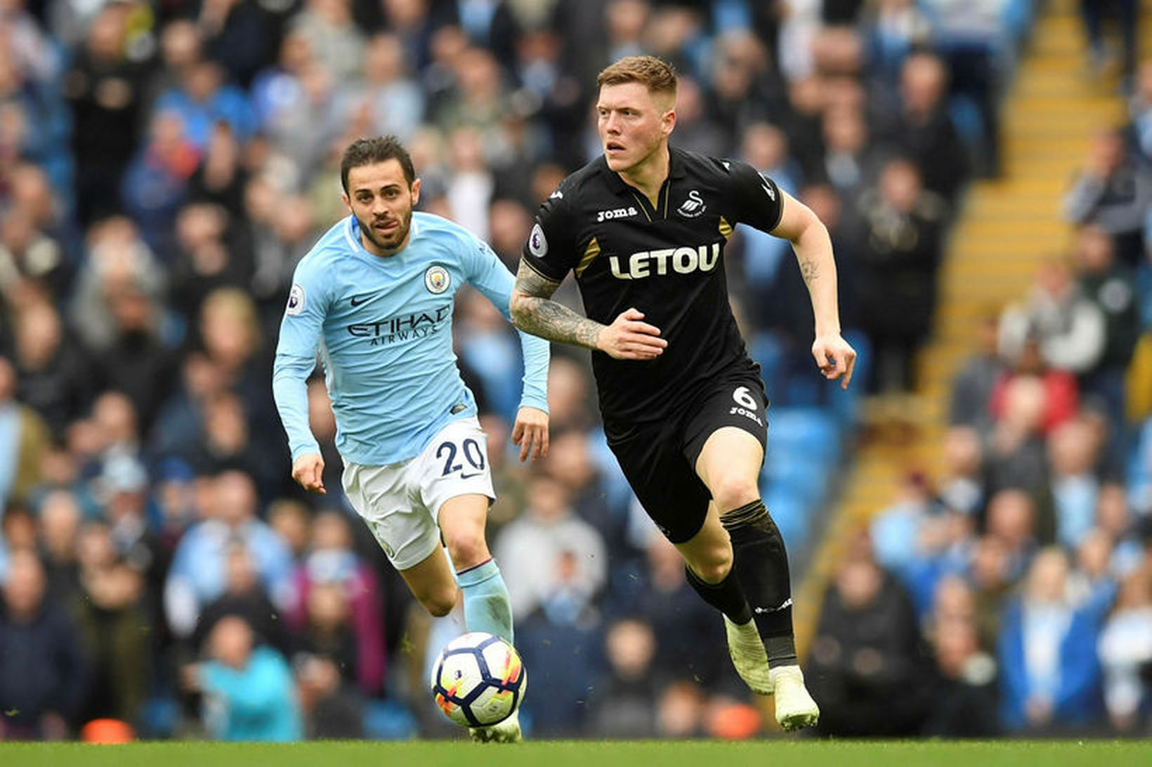 Alfie Mawson er að ganga til liðs við West Ham.