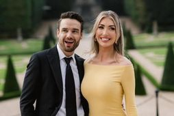 Kate Cassidy var mikið niðri fyrir þegar hún skoðaði kjólinn sem hún klæddist með Liam …