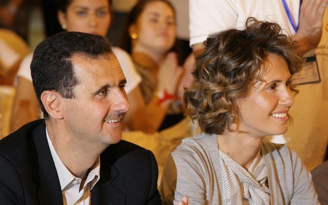 Asma al-Assad ásamt eiginmanni sínum og fyrrum Sýrlandsforseta, Bashar al-Assad.