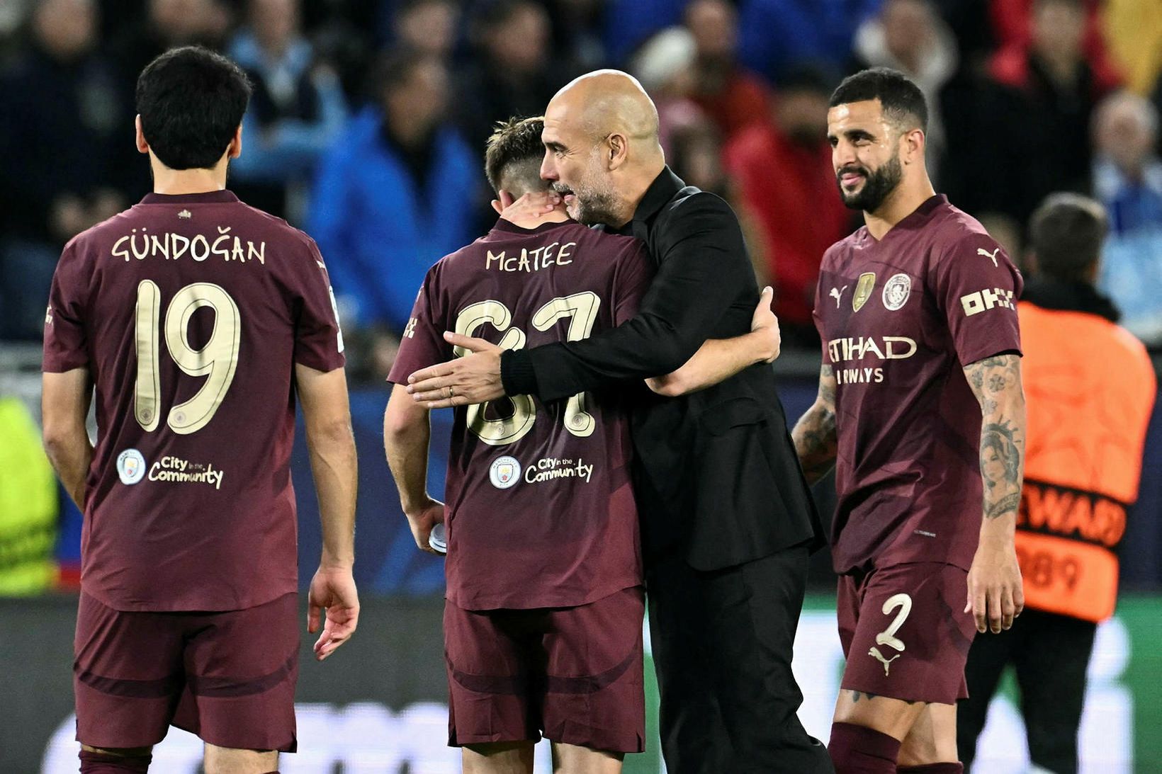 İlkay Gündoğan, James McAtee, Pep Guardiola og Kyle Walker fagna …