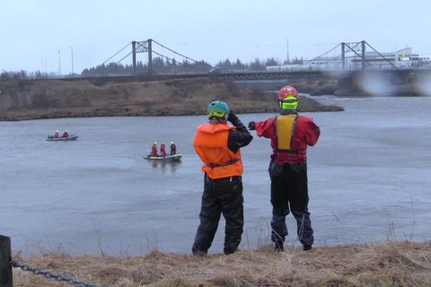 SAR team members searching the river yesterday.