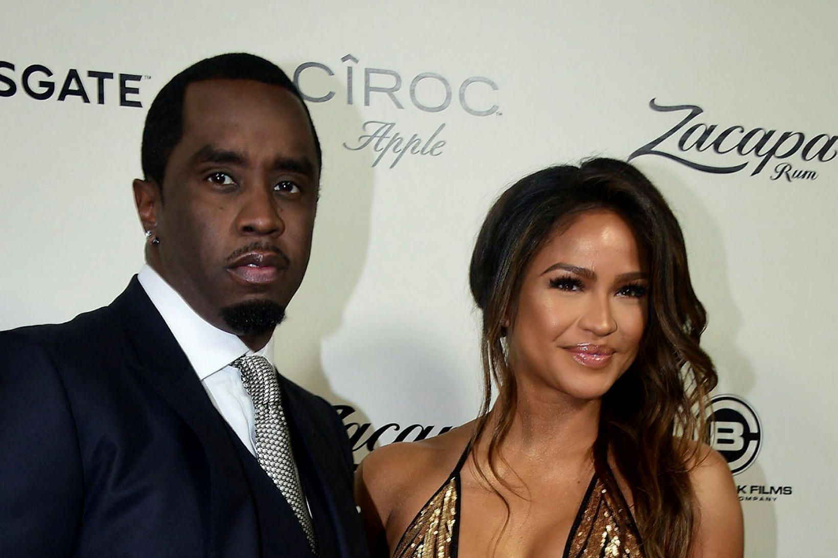 Rapparinn Sean Combs og leikkonan Cassie Ventura stilla sér upp …