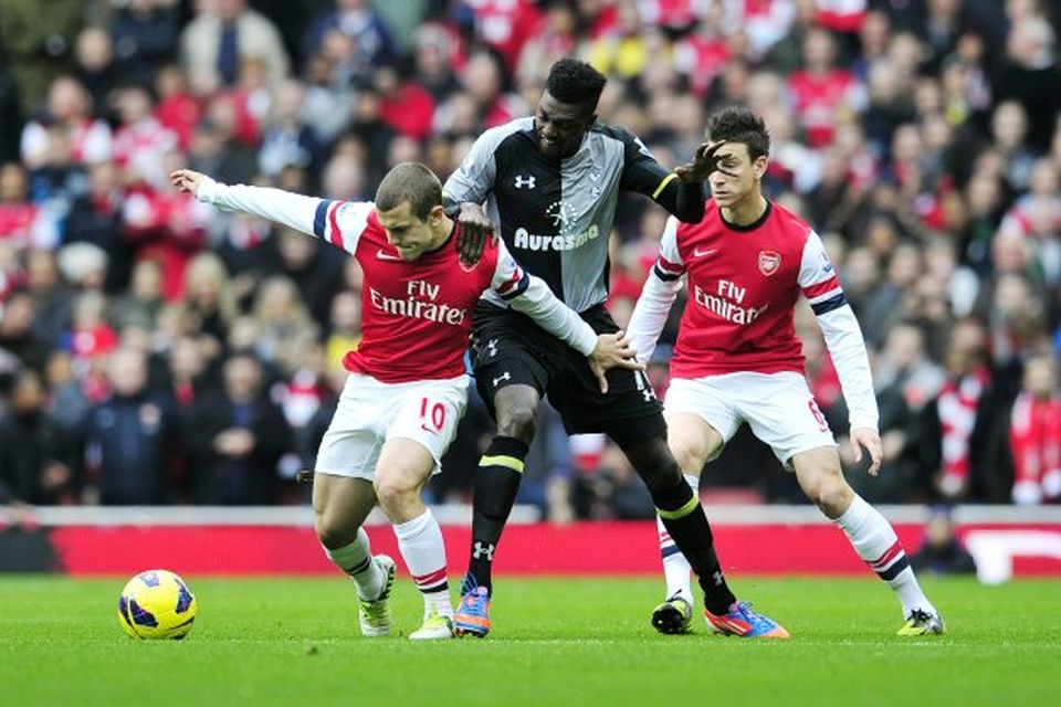 Jack Wilshere og Emmanuel Adebayor eigast við í leiknum í dag.