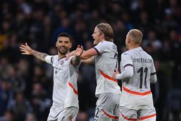Guðlaugur Victor Pálsson fagnar eftir að hafa skorað þriðja mark Íslands sem gerði í raun …