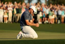 Rory McIlroy fagnaði vel og innilega þegar sigurinn var í höfn.
