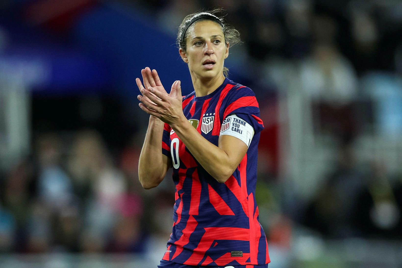 Skórnir eru komnir á hilluna hjá Carli Lloyd.