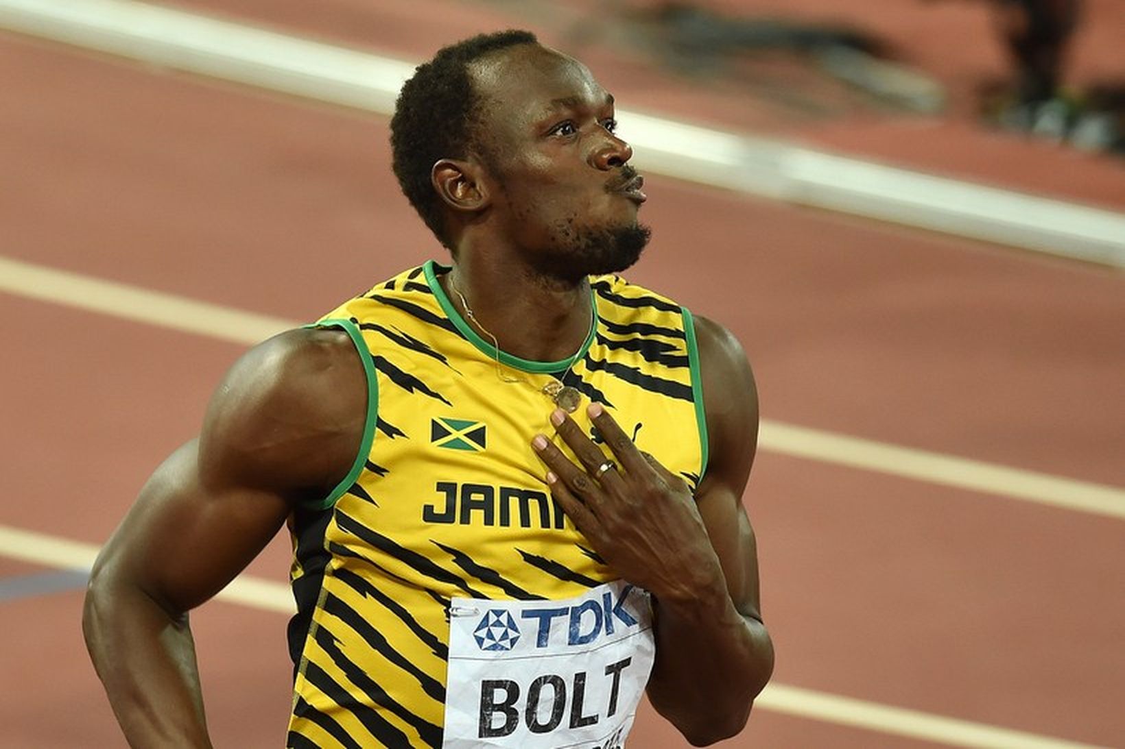 Usain Bolt fangar sigri sínum í 100 metra hlaupi á …
