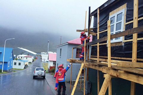 Rescue teams at work, securing scaffolding which was damaged in the storm.