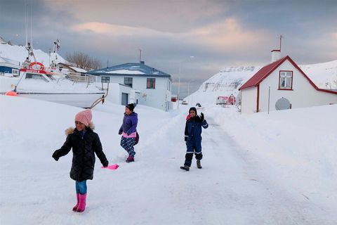 Children at play in Suðureyri yesterday.