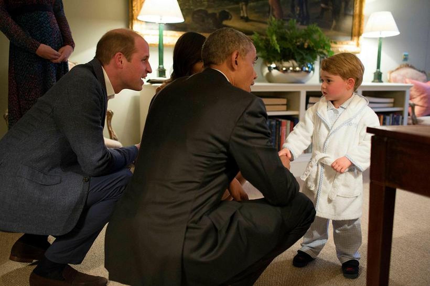 Georg prins ræðir við Obama hjónin.