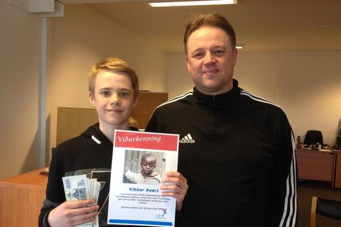 Viktor with his father at the ABC children's aid offices in Reykjavik.