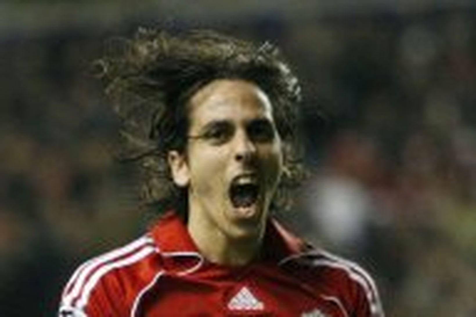 Yossi Benayoun fagnar þriðja marki sínu gegn Besiktas í fyrrakvöld.