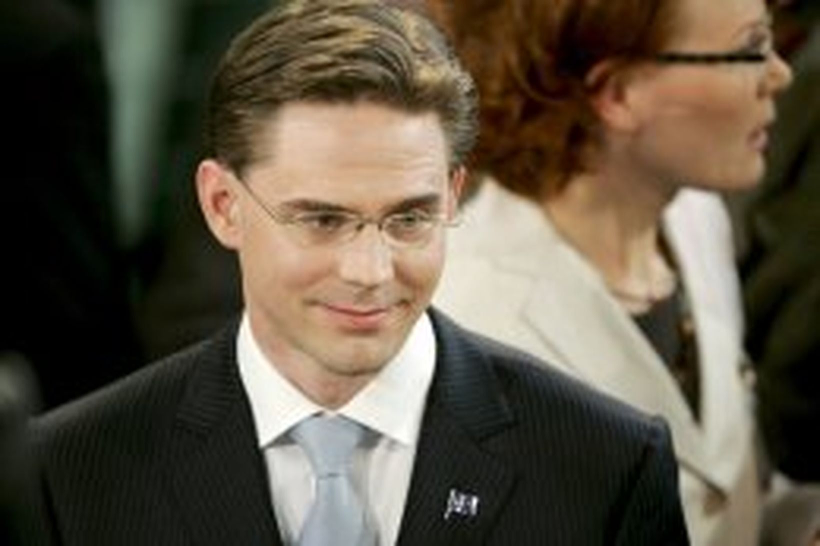 Jyrki Katainen, leiðtogi finnskra hægrimanna, var ánægður með fyrstu tölur …