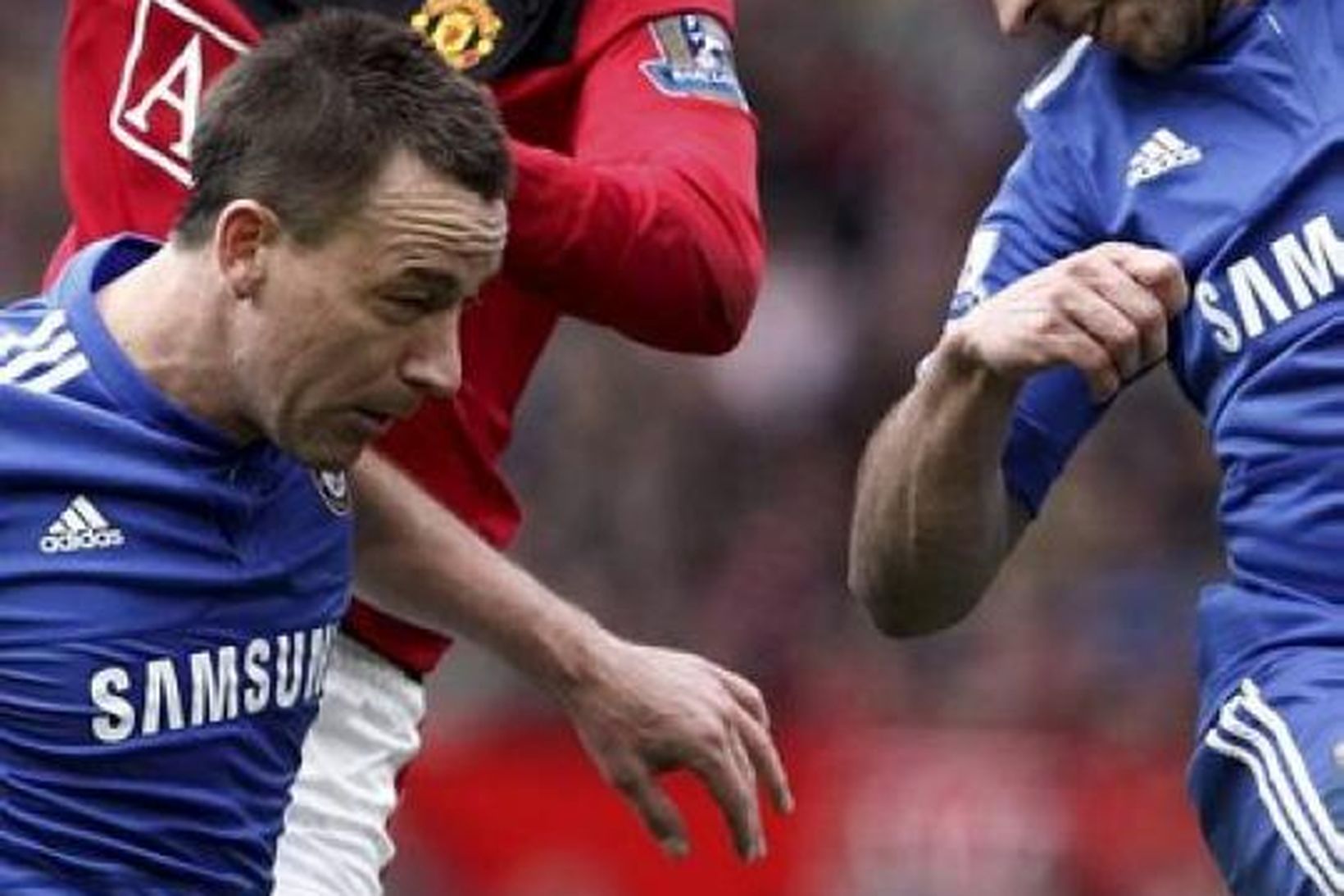 Dimitar Berbatov í baráttu við John Terry og Alex í …