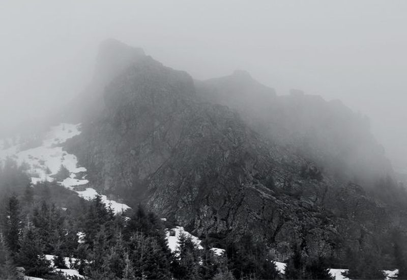 The photo shows Izvorul Calimanului in the Carpathian Mountains - an empty mountain top where Bram Stoker imagined his Castle Dracula to be located.