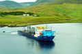 Framkvæmdir Skipið Aura var notað til að leggja strenginn og hér lónar það úti fyrir Hrafnseyri, þeim merka stað.