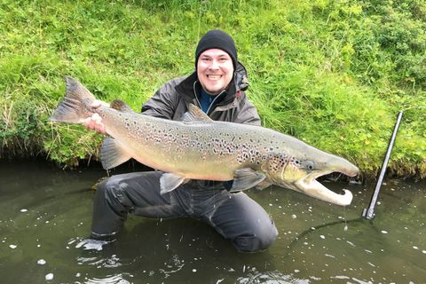 Arnór Maximilian and a 108 cm long salmon which he caught fly-fishing.