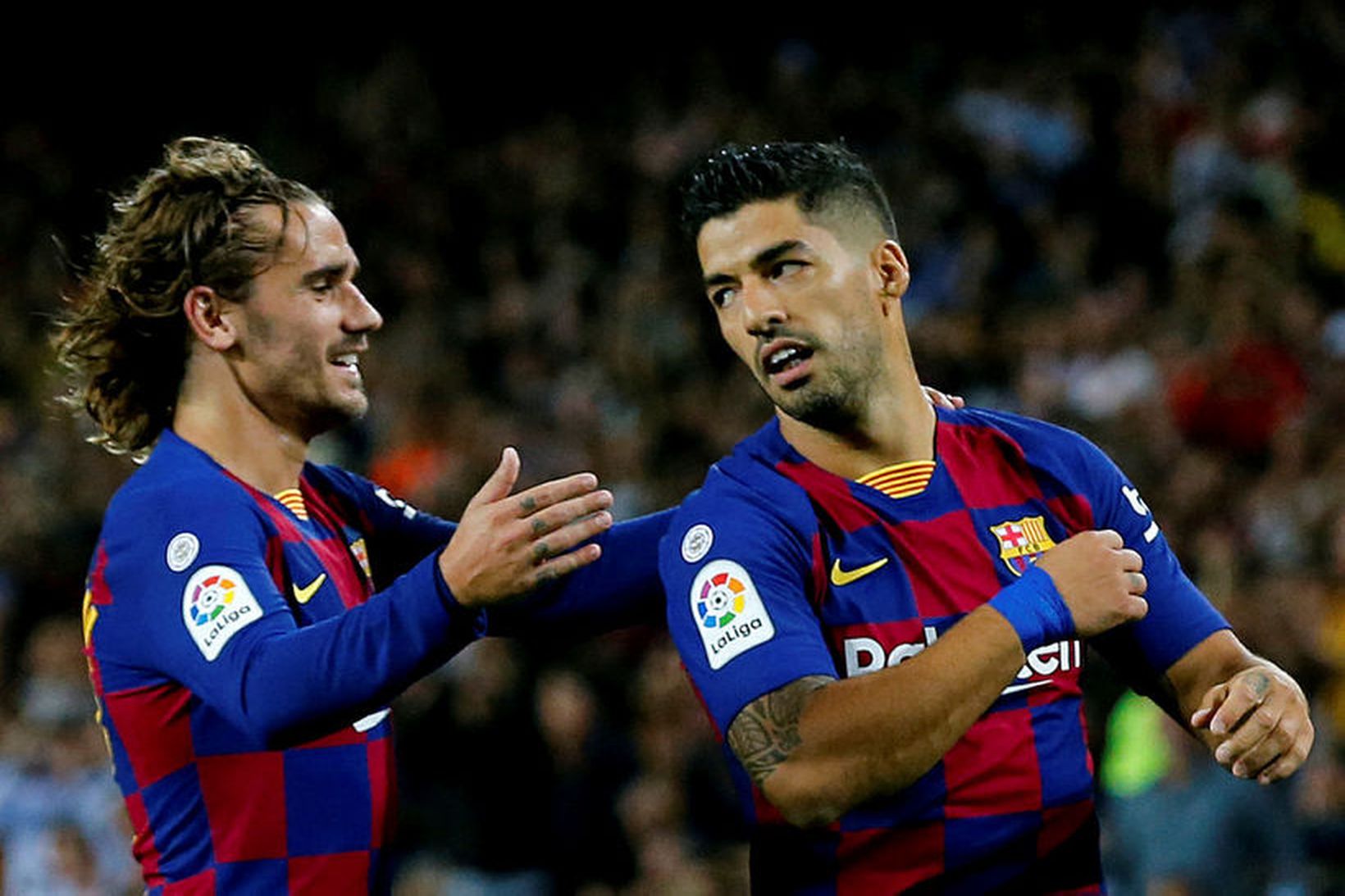 Luis Suárez og Antoine Griezmann fagna marki með Barcelona.