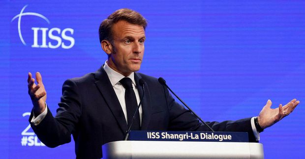 Emmanuel Macron í Singapúr í dag.