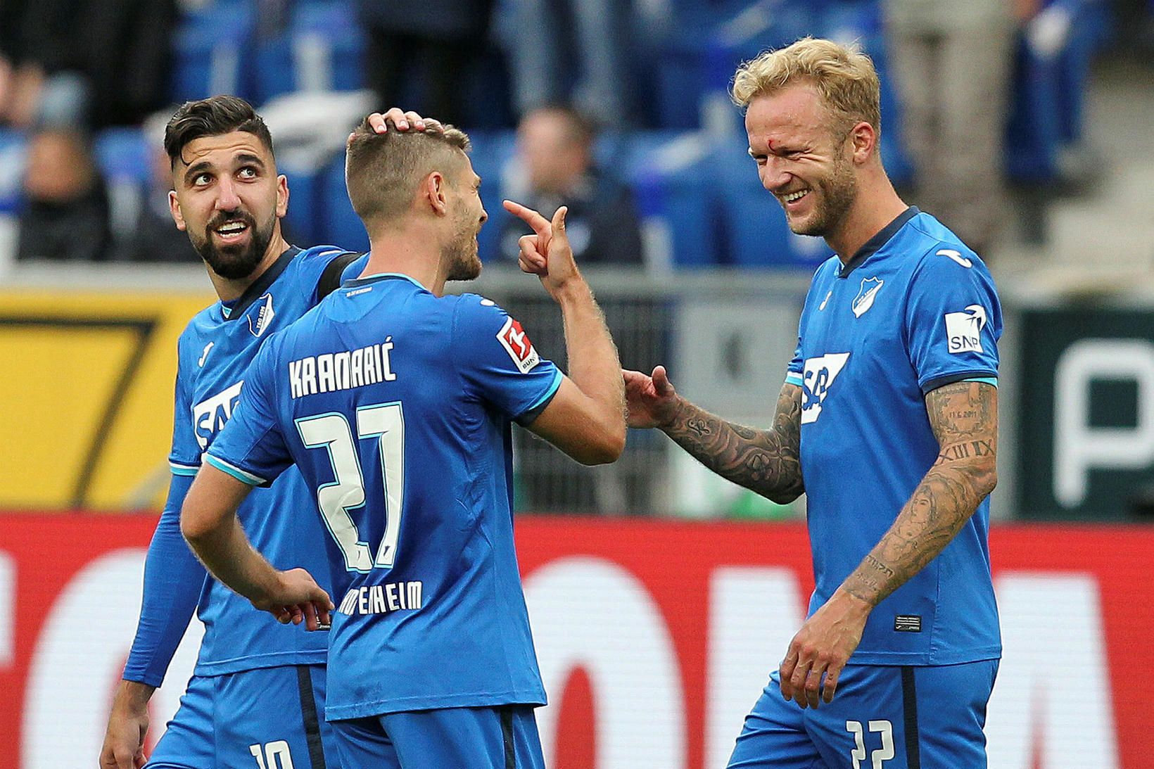 Leikmenn Hoffenheim fagna Króatanum Andrej Kramaric eftir að hann kom …