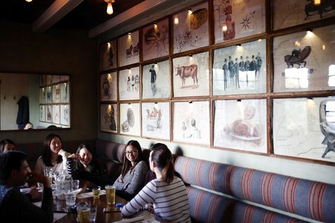 Subdued pistachio walls and creepy drawings at the mysterious nameless pizza place, otherwise known as Hverfisgata 12.