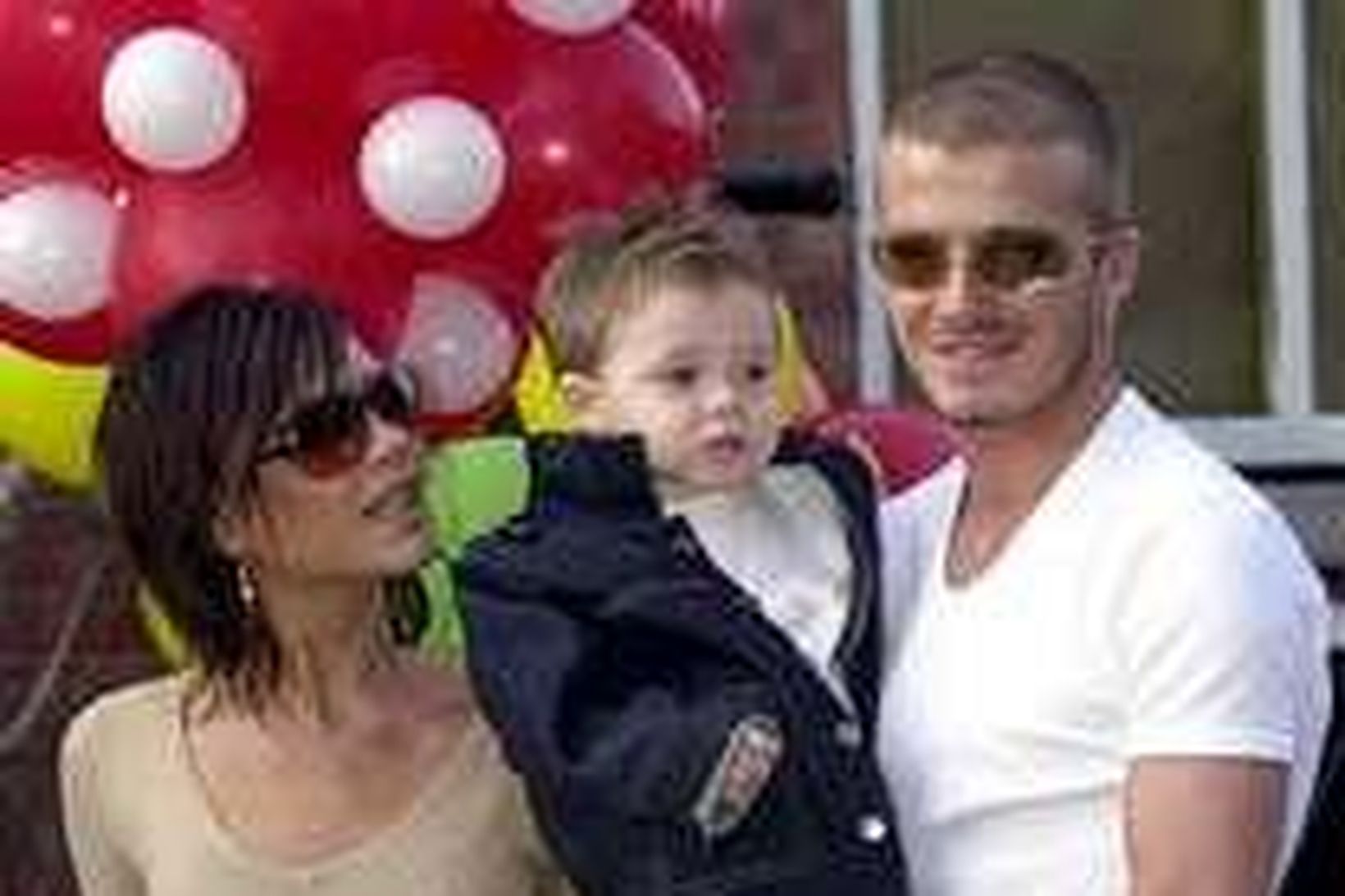 Victoria og David Beckham með soninn Brooklyn.