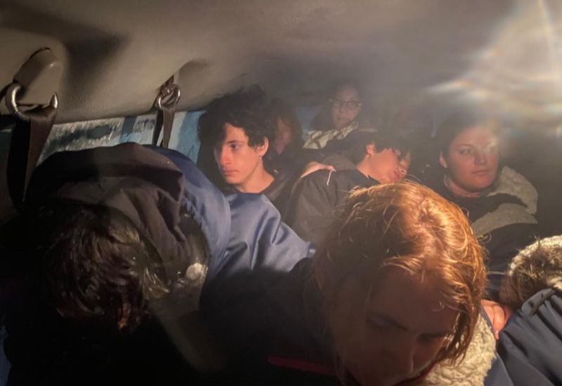 Waiting for help inside the crammed vehicle.