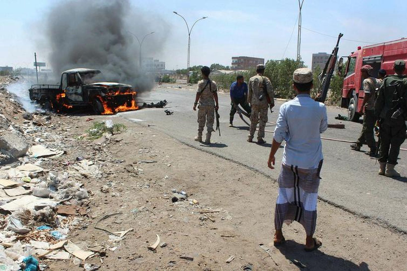 Frá vettvangi árásar Al-Kaída í Aden í Jemen um helgina.