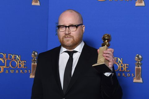Composer Jóhann Jóhannsson holds the award for Best Original Score, Motion Picture for "The Theory of Everything,"  at the 72nd annual Golden Globe Awards.